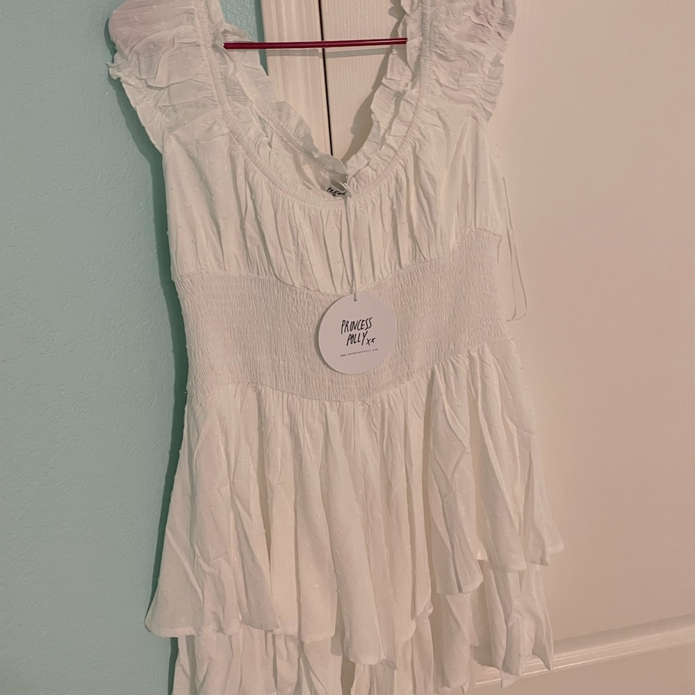 White, flowy romper from Princess Polly